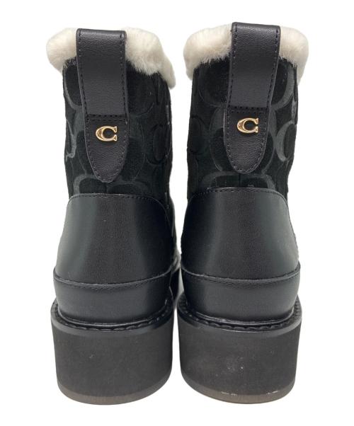 COACH（コーチ）COACH (コーチ) INDI SUEDE BOOTIE シグネチャー ムートンショートブーツ ブラック サイズ:EUR 35.5の古着・服飾アイテム