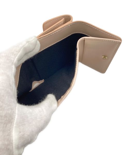 serapian（セラピアン）serapian (セラピアン) コンパクトウォレットの古着・服飾アイテム