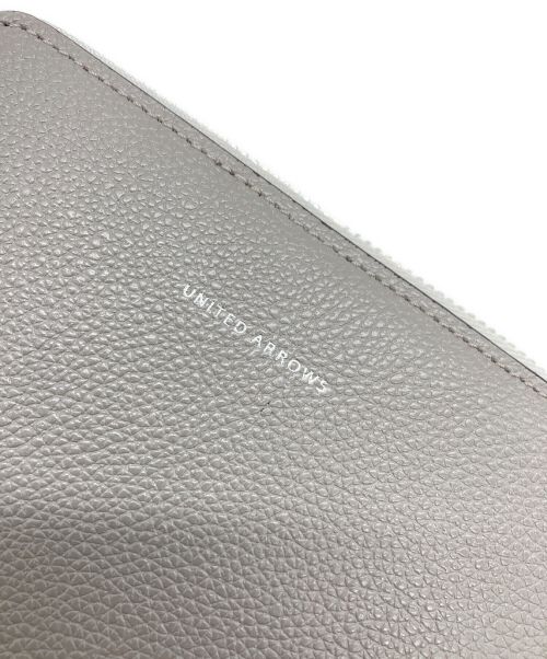 UNITED ARROWS（ユナイテッドアローズ）UNITED ARROWS (ユナイテッドアローズ) ポケットミディアムウォレット グレー×ブラウンの古着・服飾アイテム