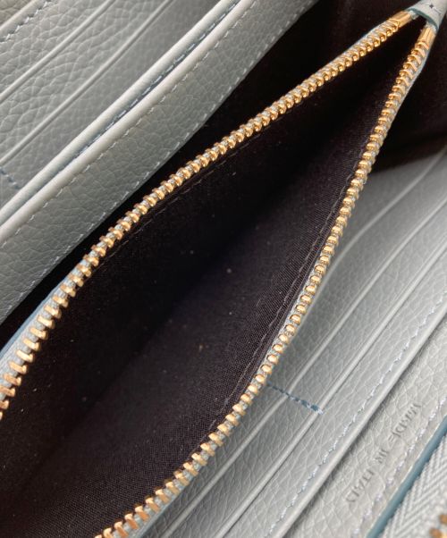 serapian（セラピアン）serapian (セラピアン) ラウンドファスナー長財布 スカイブルーの古着・服飾アイテム