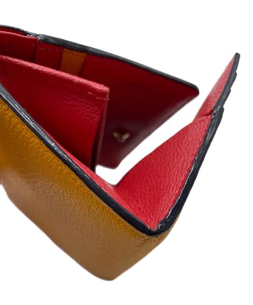 PAUL SMITH（ポールスミス）PAUL SMITH (ポールスミス) 2つ折り財布 オレンジの古着・服飾アイテム