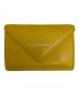 BALENCIAGA（バレンシアガ）の古着「ペーパーミニウォレット」｜イエロー