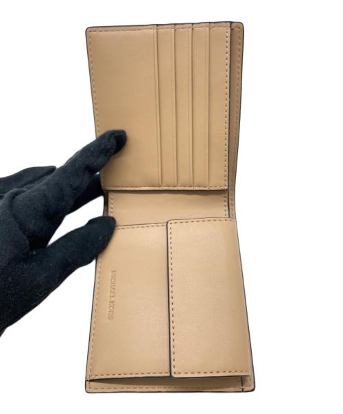 MICHAEL KORS（マイケル・コース）MICHAEL KORS (マイケル・コース) 2つ折り財布 グレーの古着・服飾アイテム