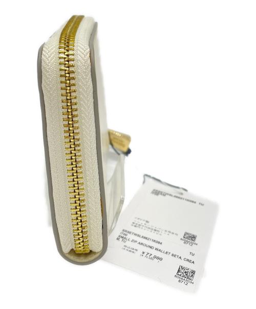 serapian（セラピアン）serapian (セラピアン) コンパクトウォレット アイボリーの古着・服飾アイテム