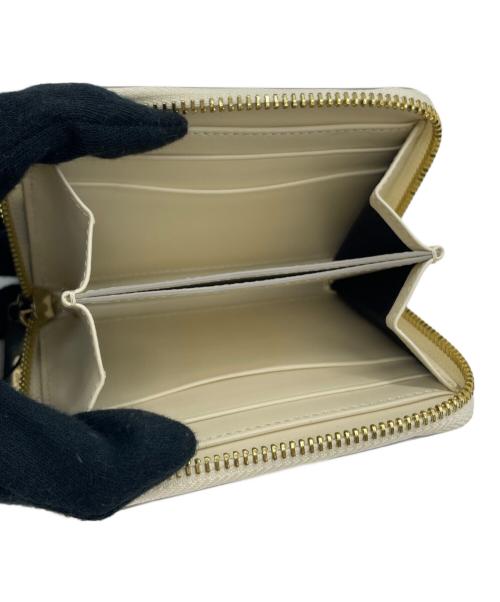 serapian（セラピアン）serapian (セラピアン) コンパクトウォレット アイボリーの古着・服飾アイテム