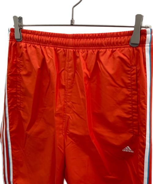 adidas（アディダス）adidas (アディダス) ナイロンパンツ オレンジ サイズ:Lの古着・服飾アイテム