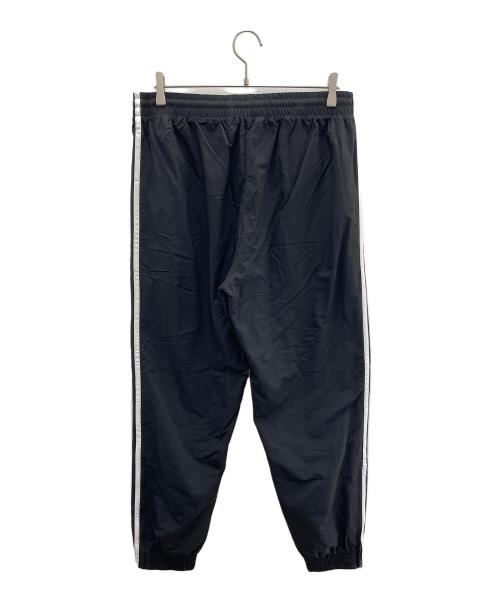 adidas Originals（アディダスオリジナル）adidas Originals (アディダスオリジナル) アディカラー ウーブン ファイヤーバードトラックパンツ ブラック サイズ:XLの古着・服飾アイテム