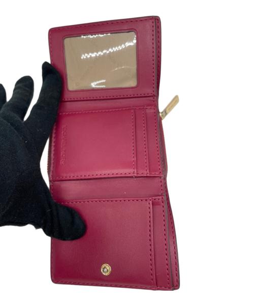 MICHAEL KORS（マイケル・コース）MICHAEL KORS (マイケル・コース) 3つ折り財布 ピンクの古着・服飾アイテム