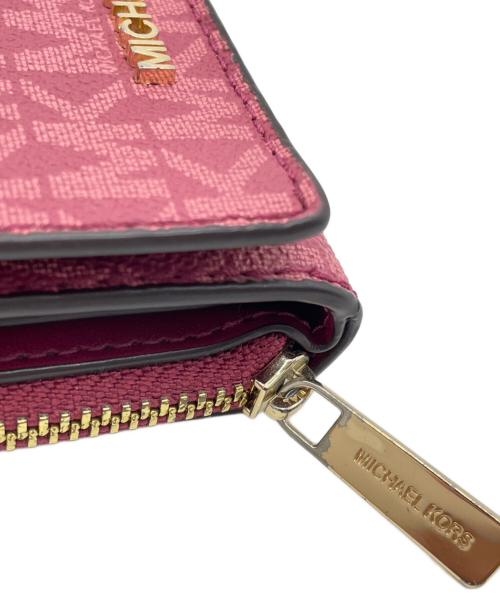 MICHAEL KORS（マイケル・コース）MICHAEL KORS (マイケル・コース) 3つ折り財布 ピンクの古着・服飾アイテム