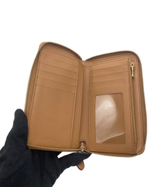 COACH（コーチ）COACH (コーチ) 2つ折り財布 ベージュの古着・服飾アイテム
