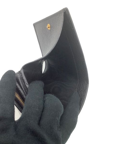 GUCCI（グッチ）GUCCI (グッチ) 2つ折り財布 ブラックの古着・服飾アイテム