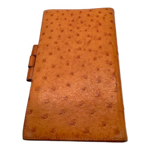 HERMES（エルメス）HERMES (エルメス) 手帳カバー オレンジの古着・服飾アイテム