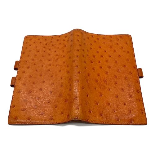 HERMES（エルメス）HERMES (エルメス) 手帳カバー オレンジの古着・服飾アイテム