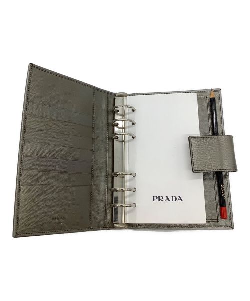 PRADA（プラダ）PRADA (プラダ) 手帳カバー シルバーの古着・服飾アイテム