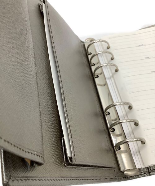 PRADA（プラダ）PRADA (プラダ) 手帳カバー シルバーの古着・服飾アイテム