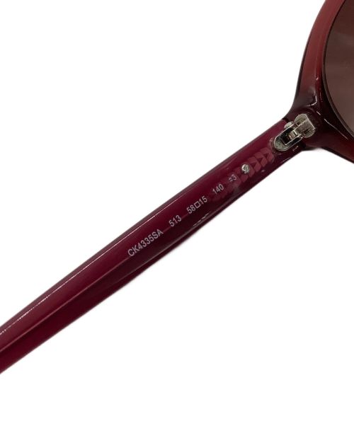 Calvin Klein（カルバンクライン）Calvin Klein (カルバンクライン) サングラス レッドの古着・服飾アイテム