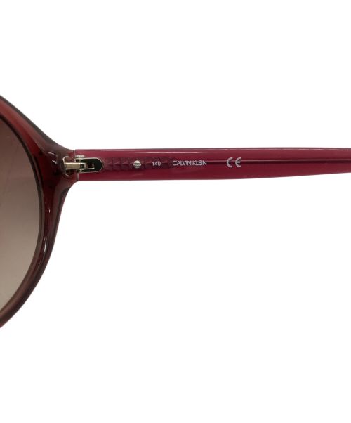 Calvin Klein（カルバンクライン）Calvin Klein (カルバンクライン) サングラス レッドの古着・服飾アイテム