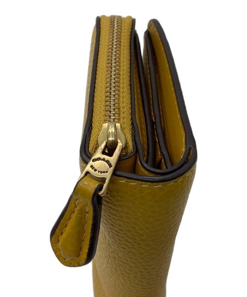 COACH（コーチ）COACH (コーチ) 2つ折り財布 イエローの古着・服飾アイテム