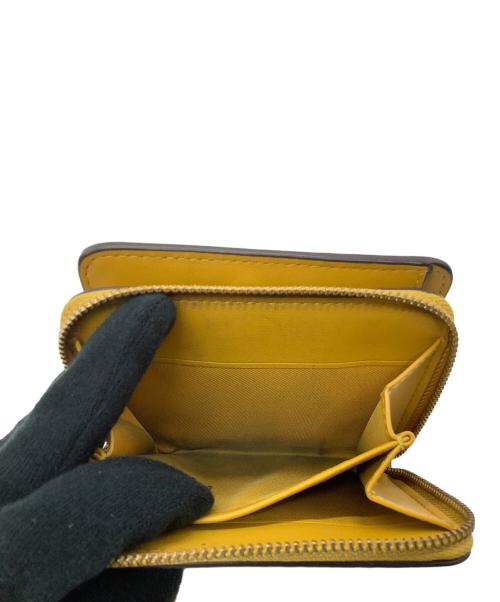 COACH（コーチ）COACH (コーチ) 2つ折り財布 イエローの古着・服飾アイテム