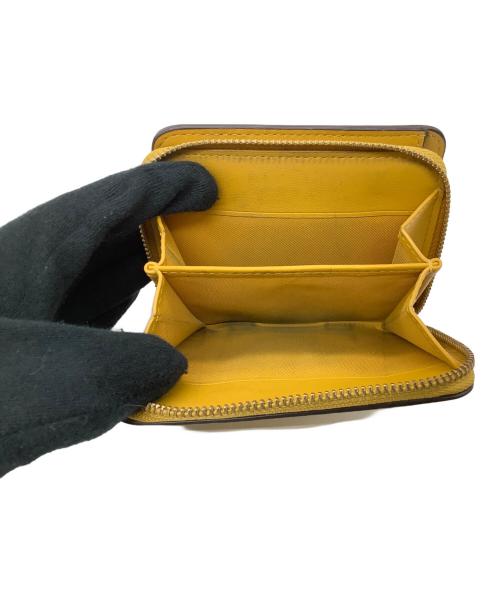 COACH（コーチ）COACH (コーチ) 2つ折り財布 イエローの古着・服飾アイテム