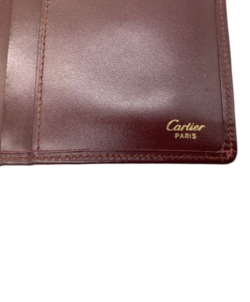 Cartier（カルティエ）Cartier (カルティエ) 札入れ ボルドーの古着・服飾アイテム