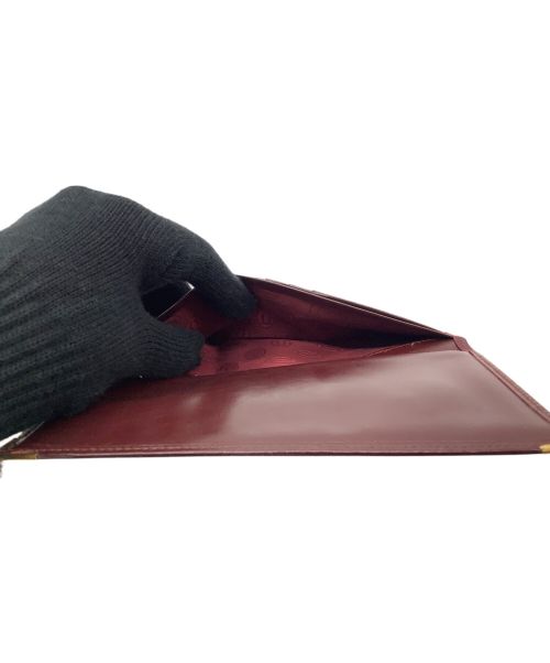 Cartier（カルティエ）Cartier (カルティエ) 札入れ ボルドーの古着・服飾アイテム