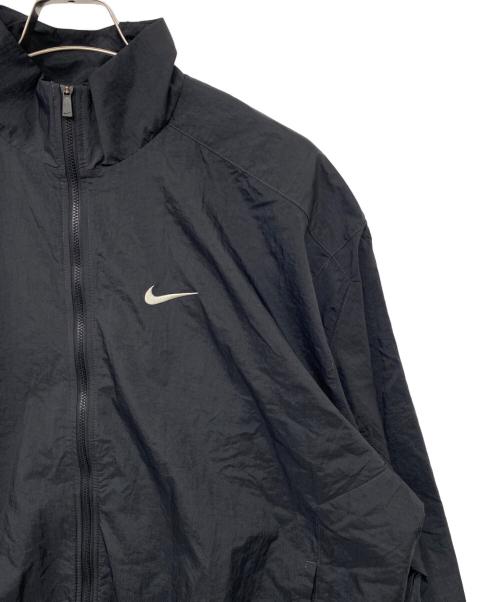 NIKE（ナイキ）NIKE (ナイキ) Club Oversized Woven Track Jacket Off Noir College Grey ブラック サイズ:Lの古着・服飾アイテム