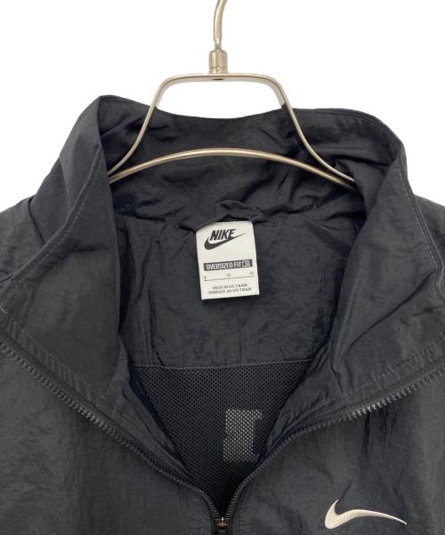NIKE（ナイキ）NIKE (ナイキ) Club Oversized Woven Track Jacket Off Noir College Grey ブラック サイズ:Lの古着・服飾アイテム