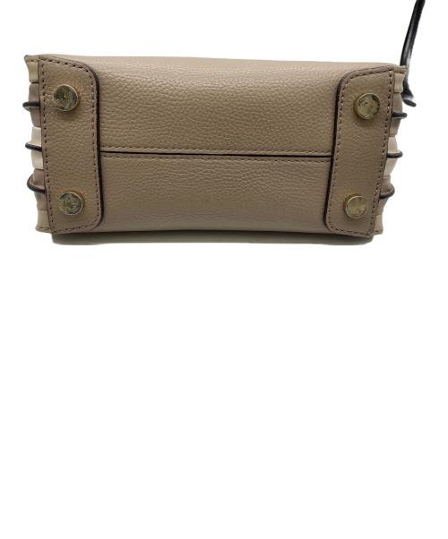 MICHAEL KORS（マイケルコース）MICHAEL KORS (マイケルコース) ハンドバッグ ベージュの古着・服飾アイテム