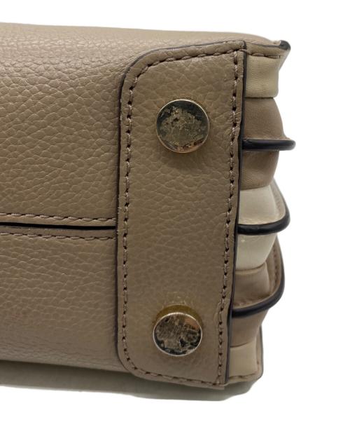MICHAEL KORS（マイケルコース）MICHAEL KORS (マイケルコース) ハンドバッグ ベージュの古着・服飾アイテム