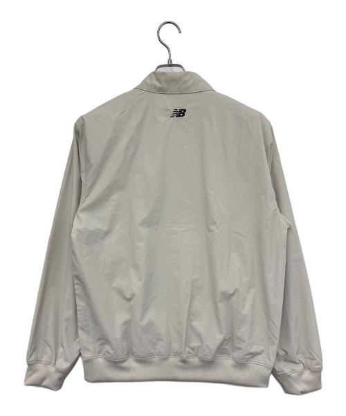 NEW BALANCE（ニューバランス）NEW BALANCE (ニューバランス) コーチジャケット ベージュ サイズ:Ｍ 未使用品の古着・服飾アイテム