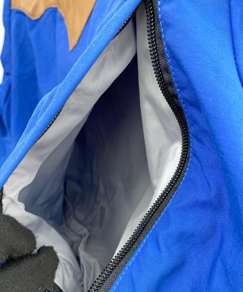 RockyMountainFeatherBed（ロッキーマウンテンフェザーベッド）RockyMountainFeatherBed (ロッキーマウンテンフェザーベッド) ナイロンジャケット ブルー×ブラウン サイズ:Ｍの古着・服飾アイテム