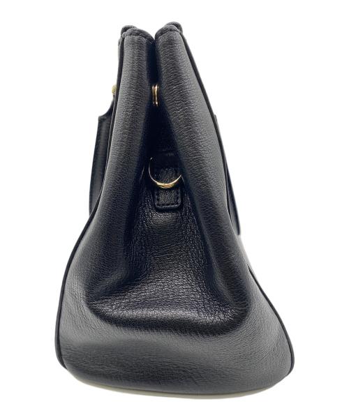 ANYA HINDMARCH（アニヤ・ハインドマーチ）ANYA HINDMARCH (アニヤ・ハインドマーチ) 2WAYバッグ ブラックの古着・服飾アイテム