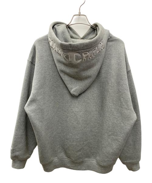 Champion（チャンピオン）Champion (チャンピオン) THE BLACK EYE PATCH (ブラックアイパッチ) プルオーバーパーカー グレー サイズ:XLの古着・服飾アイテム