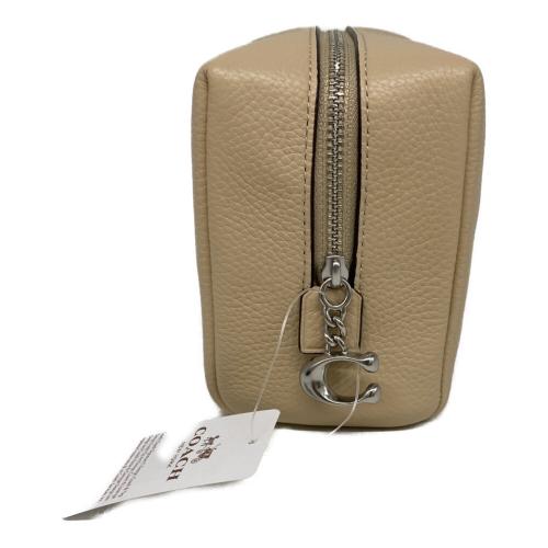 COACH（コーチ）COACH (コーチ) ポーチ ベージュの古着・服飾アイテム
