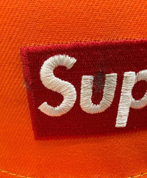 New Era（ニューエラ）New Era (ニューエラ) SUPREME (シュプリーム) キャップ オレンジの古着・服飾アイテム