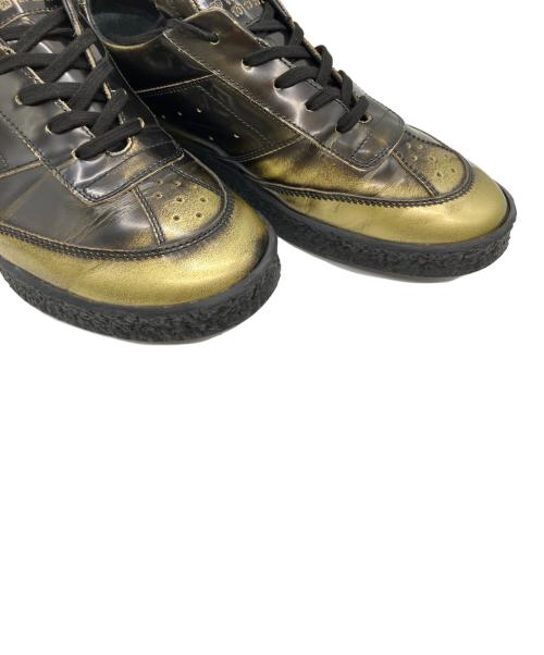 MM6 Maison Margiela（エムエムシックスメゾンマルジェラ）MM6 Maison Margiela (エムエムシックスメゾンマルジェラ) ローカットスニーカー ゴールド×ブラック サイズ:25.5の古着・服飾アイテム