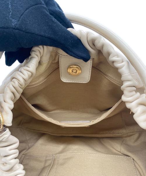 Salvatore Ferragamo（サルヴァトーレ フェラガモ）Salvatore Ferragamo (サルヴァトーレ フェラガモ) ハンドバッグ ベージュの古着・服飾アイテム