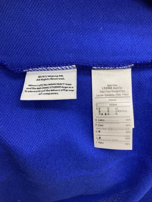 LACOSTE X MINECRAFT（ラコステ×マインクラフト）LACOSTE X MINECRAFT (ラコステ×マインクラフト) ポロシャツ ブルー サイズ:0XS 未使用品の古着・服飾アイテム