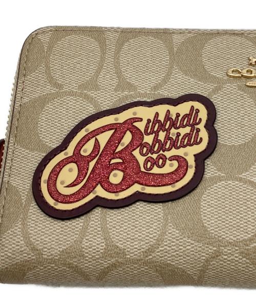 COACH（コーチ）COACH (コーチ) DISNEY (ディズニー) DISNEYコラボ シンデレラ パッチ PVC シグネチャー 長財布 ベージュの古着・服飾アイテム