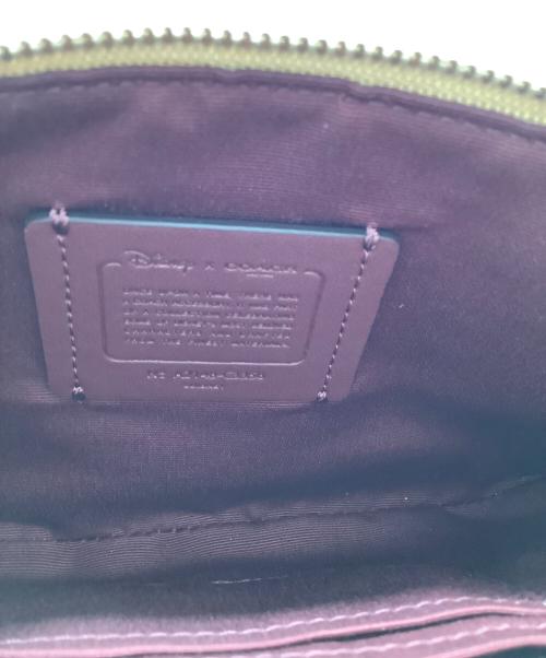 COACH（コーチ）COACH (コーチ) DISNEY (ディズニー) シンデレラパッチラージリストレットポーチ ベージュの古着・服飾アイテム