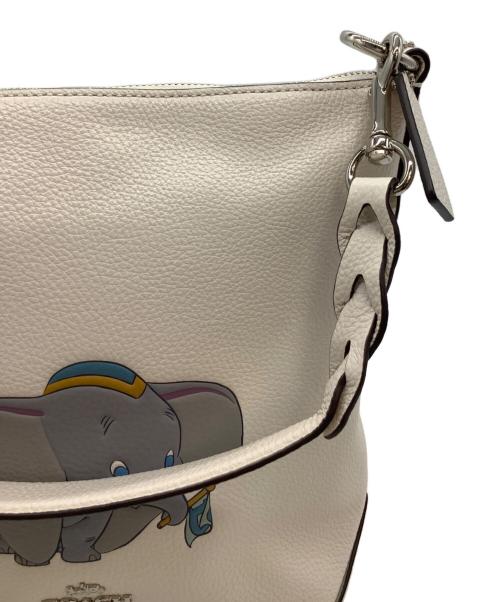 COACH（コーチ）COACH (コーチ) DISNEY (ディズニー) ミニ アビー ダッフル ダンボ ショルダーバッグ アイボリーの古着・服飾アイテム