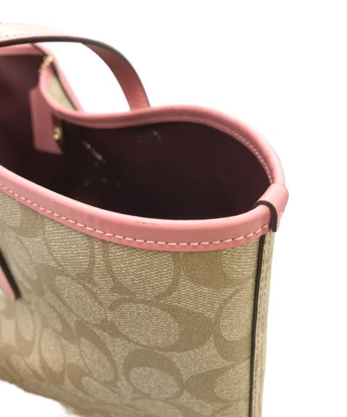 COACH（コーチ）COACH (コーチ) DISNEY (ディズニー) ディズニーシティー トートバッグ ベージュの古着・服飾アイテム