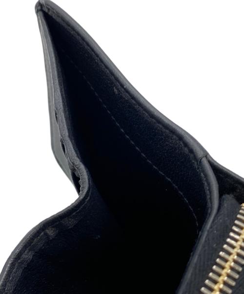 Yves Saint Laurent（イヴサンローラン）Yves Saint Laurent (イヴサンローラン) 2つ折り財布 ネイビーの古着・服飾アイテム