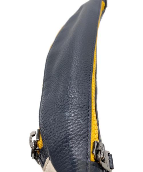 COACH（コーチ）COACH (コーチ) PEANUTS (ピーナッツ) コラボウエストバッグ ネイビー×ホワイトの古着・服飾アイテム