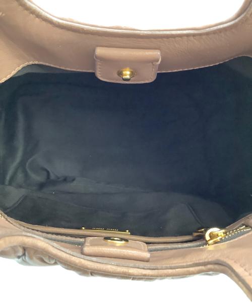 MIU MIU（ミュウミュウ）MIU MIU (ミュウミュウ) マテラッセ ブラウンの古着・服飾アイテム