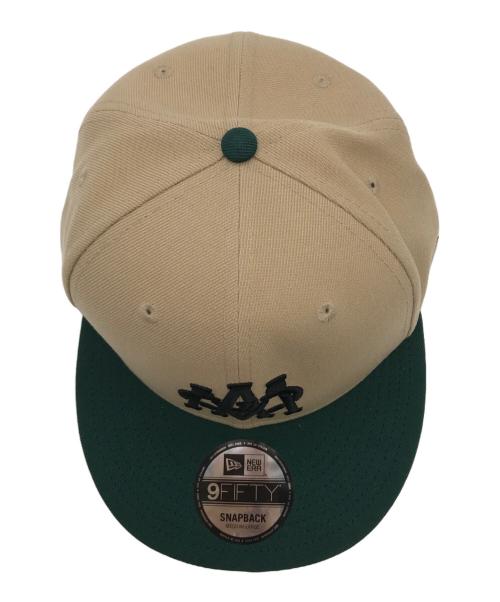 New Era（ニューエラ）New Era (ニューエラ) ATOMS (アトムズ) ロゴキャップ ブラウン×グリーン サイズ:MEDIUM/LARGE 未使用品の古着・服飾アイテム