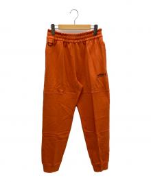 adidas（アディダス）の古着「アドベンチャースウェットパンツ」｜オレンジ