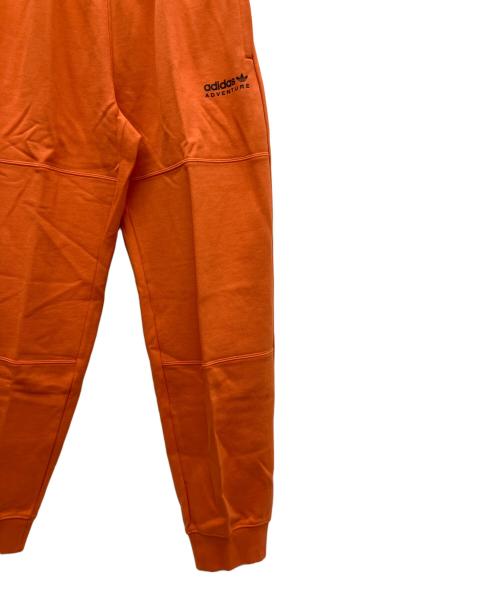 adidas（アディダス）adidas (アディダス) アドベンチャースウェットパンツ オレンジ サイズ:SIZE L 未使用品の古着・服飾アイテム