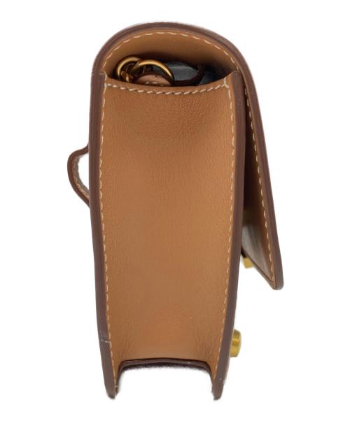 TOD'S（トッズ）TOD'S (トッズ) Tタイムレス ブラウンの古着・服飾アイテム